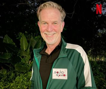An image of Netflix co-CEO Reed Hastings wearing green tracksuit that worn by "Squid Game" contestants in the show. [SCREEN CAPTURE] 
