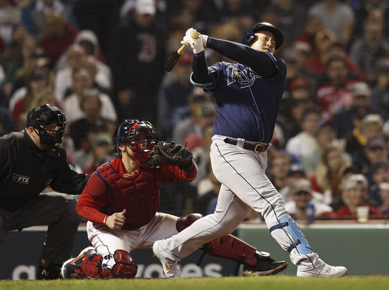 Tampa Bay Rays first baseman Choi Ji-man strikes out on a pitch from Boston Red Sox relief pitcher Josh Taylor during the seventh inning of game four of the American League Division Series at Fenway Park in Boston on oct. 11. [EPA/YONHAP]