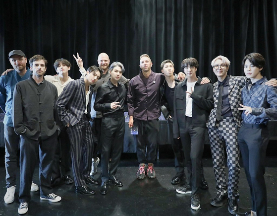 BTS and Coldplay in New York on Sept. 23, a day before the release of their single ″My Universe″ on Friday. [BTS TWITTER]