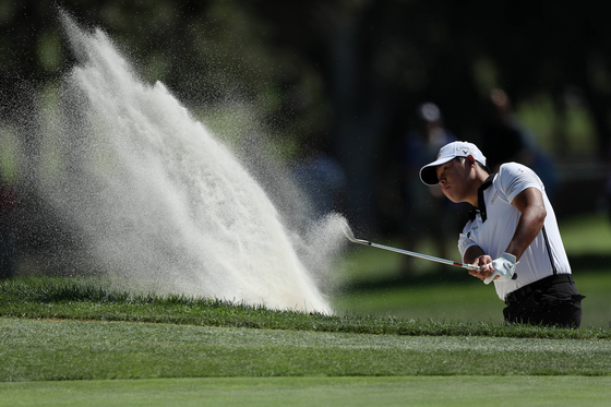 Kim Si-woo hits from the bunker on the third hole during round two of the Fortinet Championship at Silverado Resort and Spa on September 17, 2021 in Napa, California.  [AFP/YONHAP]