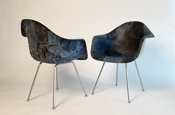 The upcycled Eams chairs using jeans and epoxy. [FABRIKR]