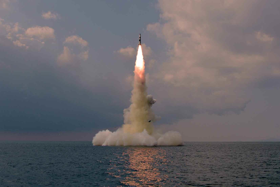 A new type of submarine-launched ballistic missile (SLBM) is test-fired from a submarine Tuesday, reported North Korea's state-run media Wednesday. [RODONG SINMUN]