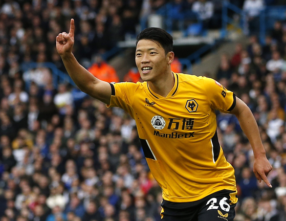 Wolverhampton Wanderers' Hwang Hee-Chan celebrates scoring against Leeds United on Saturday. [REUTERS/YONHAP]