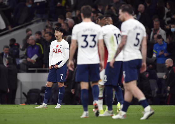 Tottenham Hotspur's Son Heung-min looks dejected after the Premier League football match between Tottenham Hotspur and Manchester United at Tottenham Hotspur Stadium in London, on Saturday. [REUTERS/ YONHAP]