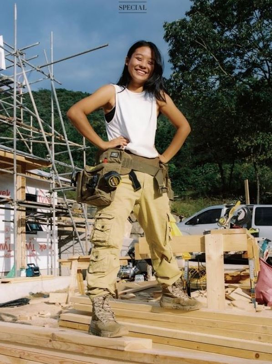 Lee A-jin, 19, dropped out of high school and is now a professional carpenter who specializes in lightweight wood frame construction. [HARPERS BAZAR KOREA]