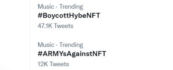 Hashtags boycotting HYBE's NFTs are trending on Twitter. [SCREEN CAPTURE]