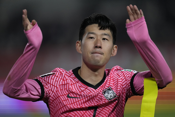 Son Heung-min waves to fans after the second leg of the third round of Asian qualifiers for the 2022 Qatar World Cup at Goyang stadium in Goyang, Gyeonngi on Nov. 11. [AP]
