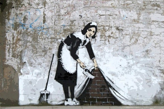 Banksy's “Sweep It Under The Carpet” drawn in North London, 2006. [JOONGANG PHOTO]