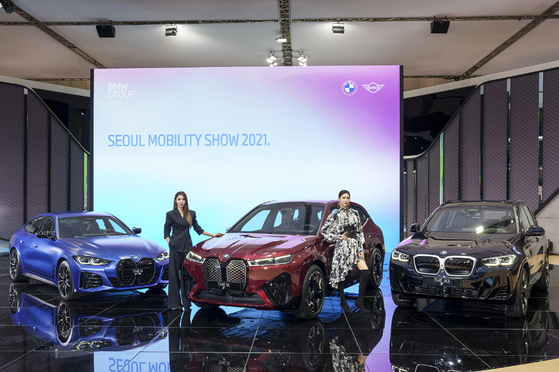 BMW's pure-electric models — the i4, from left, iX and iX3 — on display [BMW KOREA]
