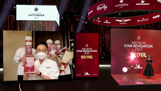 Chef Choi Joo-yong of Hane, a sushi restaurant in Seoul, poses after his restaurant earns one Michelin star. [THE MICHELIN GUIDE]