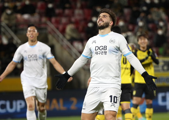 Daegu FC's Bruno Lamas celebrates after scoring a penalty in the first leg of the FA Cup final against the Jeonnam Dragons at Gwangyang Football Stadium in Gwangyang, South Jeolla on Wednesday.