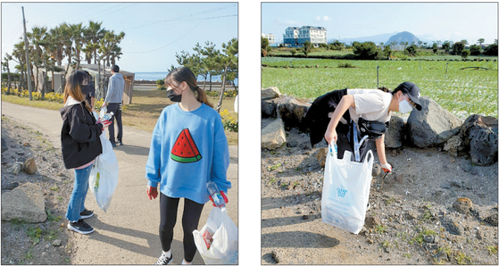 Members of KISJ Community Club, a different group at KISJ, pick up trash at Jeju’s Olle Trail on Oct. 13. [KISJ COMMUNITY]