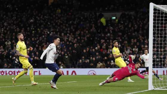 Tottenham Hotspur's Son Heung-min scores their second goal against Brentford at Tottenham Hotspur Stadium in London on Thursday. [REUTERS/YONHAP]