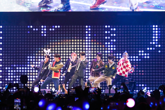 BTS performs as the opening act at the annual ″Jingle Ball″ concert at The Forum in Los Angeles, held by the Los Angeles radio station KIIS-FM, on Friday night.  [BIT HIT MUSIC] 