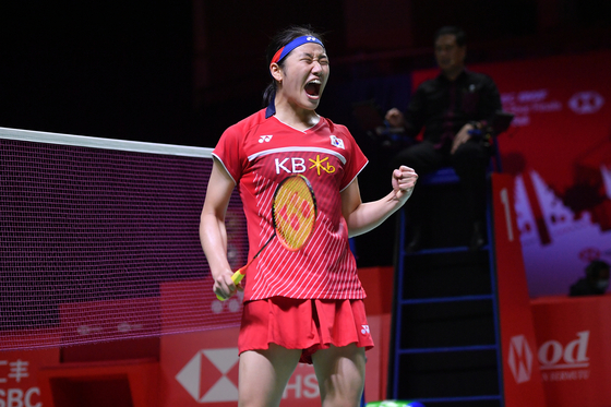 An Se-young celebrates after winning the women's singles badminton final match against Pusarla V. Sindhu of India at the BWF World Tour Finals in Nusa Dua, Indonesia on Monday. The gold medal marks her third consecutive international gold medal in the last three weeks after winning the 2021 Indonesia Masters on Nov. 21 and the SimInvest Indonesia Open 2021 on Nov. 28. [EPA/YONHAP]