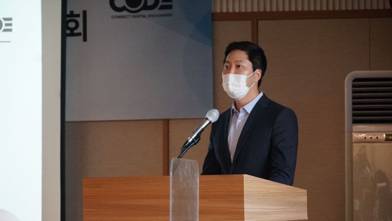 CODE CEO Cha Myung-hoon, also the CEO of Coinone, speaks during a press briefing held Wednesday. [BITHUMB]