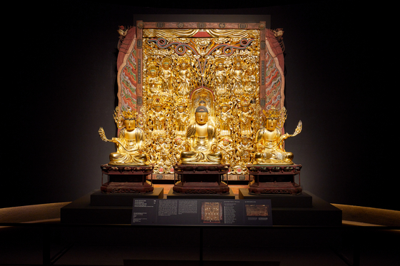 Wooden Seated Amitabha Buddha Triad and Wooden Amitabha Buddha Altarpiece of Yongmun Temple have left its temple in Yecheon, North Gyeongsang, for the first time in 337 years for the exhibition at the National Museum of Korea in central Seoul that sheds light on the Buddhist monk artisans. [NATIONAL MUSEUM OF KOREA]