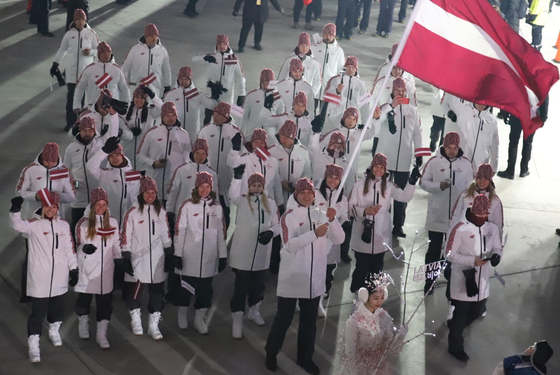 Latvian athletes smile during the 2018 PyeongChang Winter Olympics. [EMBASSY OF LATVIA IN KOREA]