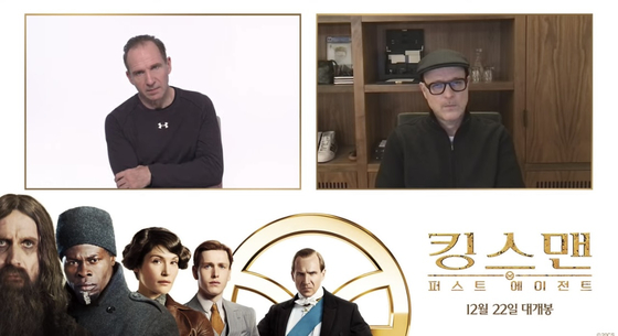 Ralph Fiennes, left, and director Matthew Vaughn participate in an online press event with Korean media on Friday. [WALT DISNEY COMPANY KOREA]