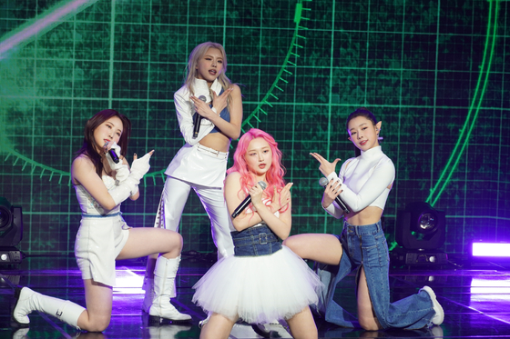 Girl group Rocking Doll during its online debut showcase on Friday. [SRP ENTERTAINMENT]
