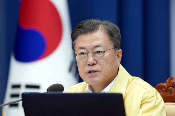 President Moon Jae-in speaks at a meeting at the Blue House with his aides and health ministers to check the government’s social distancing measures on Nov. 29. [JOINT PRESS CORPS]