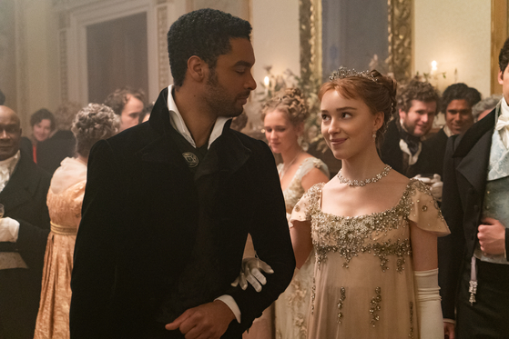 Netflix’s popular period drama “Bridgerton” (2020-) takes place in an alternate history in which 1800s London is racially integrated. [NETFLIX]