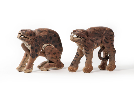 Wooden tiger figurines on display at the National Folk Museum of Korea. [NATIONAL FOLK MUSEUM OF KOREA]
