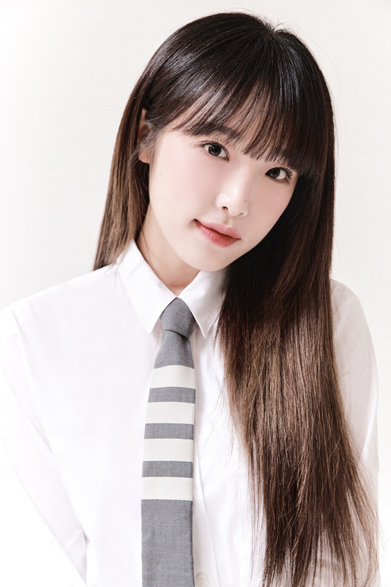 Choi Ye-na, an ex-IZ*ONE member, will make her solo debut on Jan. 17, according to her agency Yehua Entertainment Monday. [ILGAN SPORTS]