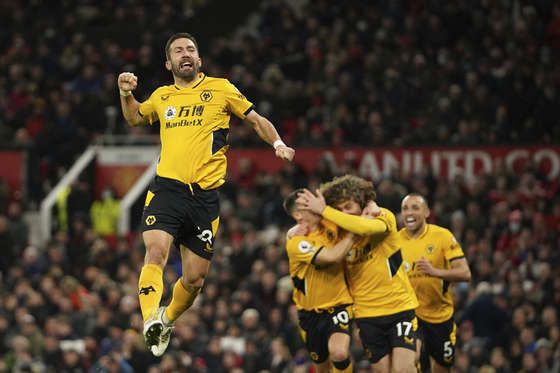 Wolverhampton Wanderers' Joao Moutinho celebrates after scoring his side's only goal during a Premier League match against Manchester United at Old Trafford in Manchester on Monday. [AP/YONHAP]