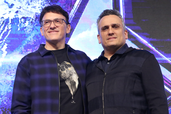 Anthony Russo, left, and Joe Russo pose for photos during a press conference for the ″Avengers: Endgame″ at the Four Seasons hotel in central Seoul on April 15, 2019. [YONHAP]