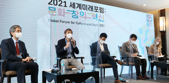 Sebastien Falletti, China and East Asia correspondent for the French daily Le Figaro, second from left, discusses strengthening communication among generations in a panel discussion at the Global Forum for Culture and Youth 2021 held on Dec. 1. [KOCIS]
