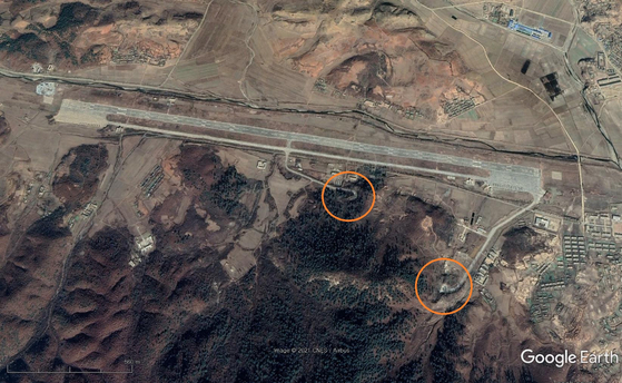 An underground hangar for aircraft on the southern side of a runway at an airfield in Nucheon-ri, North Hwanghae Province, North Korea, as seen in recent satellite imagery. [GOOGLE EARTH]