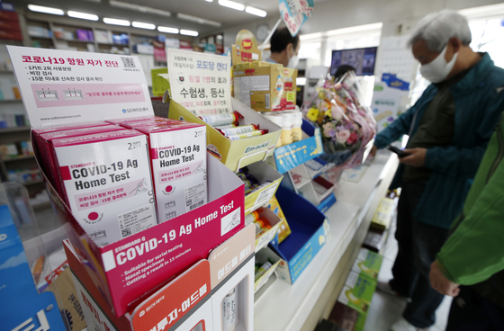 SD Biosensor's Covid-19 antigen self-test kits are displayed at a pharmacy in Seoul. [NEWS1] 