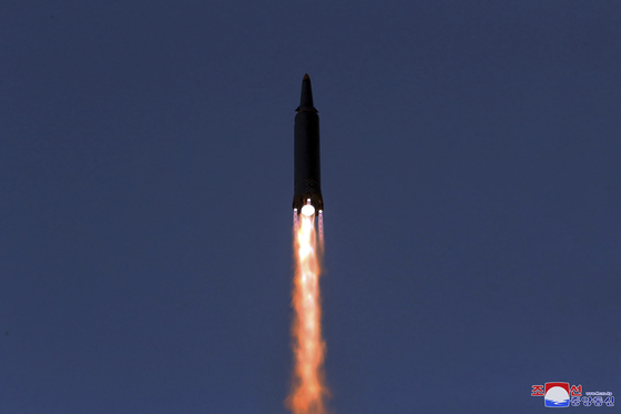 North Korea test-fires a hypersonic missile on Tuesday, as seen in a photo released by its official Korean Central News Agency (KCNA) Wednesday. North Korea’s Foreign Ministry on Friday berated the United States for imposing fresh sanctions over its latest missile tests, warning of a “stronger” reaction. It later launched two short-range missiles. [KCNA]