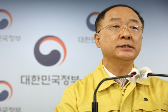 Hong Nam-ki, Finance Minister, announce the government's plan of another supplementary budget on Friday. [YONHAP] 