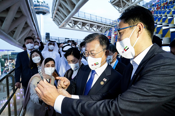 Korean President Moon Jae-in, second from right, and first lady Kim Jung-sook visit the Korean pavilion at the Expo 2020 Dubai during a visit to the United Arab Emirates Sunday. Korea is pushing to host the world exposition in Busan in 2030. [BLUE HOUSE]