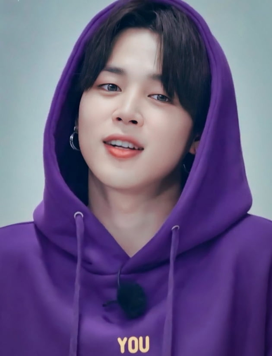 BTS member Jimin donned in the purple hoodie he has designed himself. [HYBE]