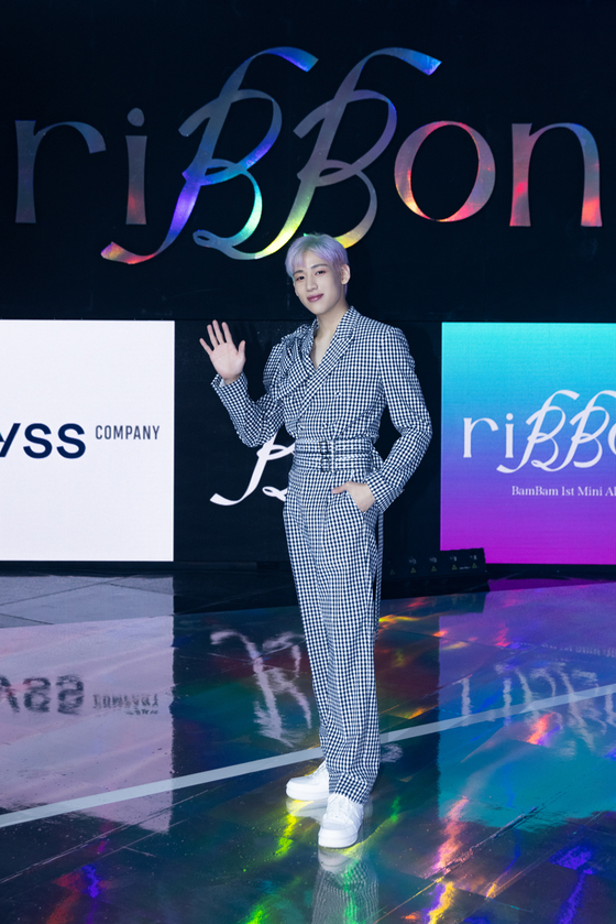 Bambam, member of boy band GOT7, poses Tuesday during a showcase for his EP "riBBon" which will drop later at 6 p.m. "riBBon" is Bambam's first-ever solo album since debuting in 2014. It is also the first time for him to come out with music since the members of GOT7 left their long-time agency JYP Entertainment earlier this year and signed with different agencies.