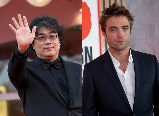 Director Bong Joon-ho, left, and Robert Pattinson [VENICE INTERNATIONAL FILM FESTIVAL]