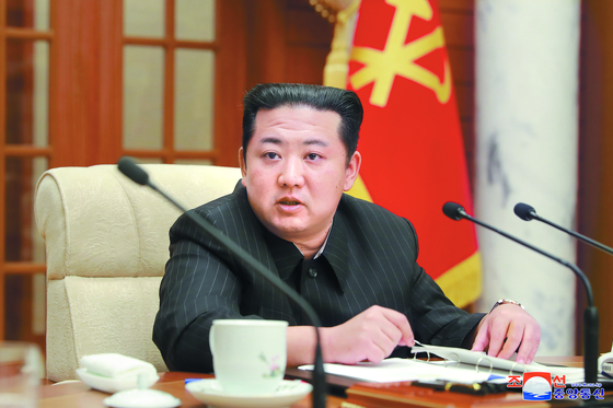In a photograph released by the North's Korean Central News Agency, North Korean leader speaks at a Korean Workers' Party Politburo meeting in Pyongyang on Wednesday. [YONHAP]