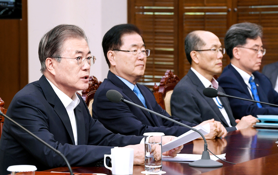 President Moon Jae-in said heated controversy over former Justice Minister Cho Kuk was not “national division” in a meeting at the Blue House in 2019. [JOINT PRESS COPRS]