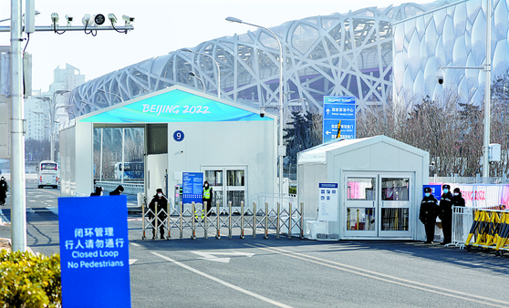 The general public’s entry to the main stadium of the Beijing Winter Olympics is strictly controlled. [REUTERS/YONHAP]