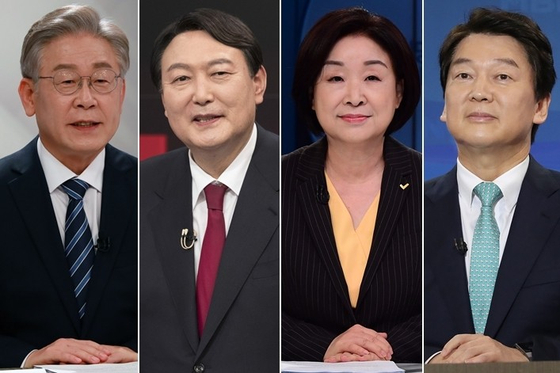 From left, Lee Jae-myung of the ruling Democratic Party; Yoon Suk-yeol of the main opposition People Power Party; Sim Sang-jung of minor progressive Justice Party; and Ahn Cheol-soo of minor opposition People's Party, the four major presidential candidates. [YONHAP/JOINT PRESS CORPS]