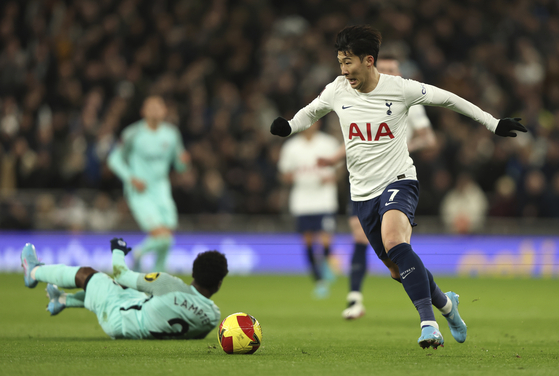 Tottenham Hotspur's Son Heung-min in action during an FA Cup fourth round match against Brighton at Tottenham Hotspur Stadium in London on Saturday.  [AP/YONHAP]