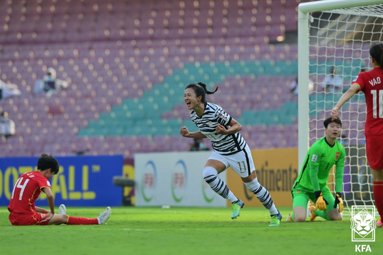 Choe Yu-ri celebrates after scoring the opening goal against China in the final of the 2022 Women's Asian Cup at DY Patil Stadium in Navi Mumbai, India on Sunday. [NEWS1]