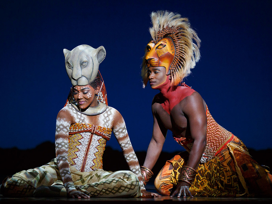 Amanda Kunene as Nala and Dashaun Young as Simba during a scene in the 2022 international tour team's production of "The Lion King" in Seoul. [S&CO]