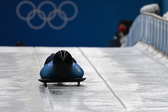 Kim Eun-ji competes in the women's skeleton event at the Yanqing National Sliding Centre during the Beijing 2022 Winter Olympic Games in Yanqing on Friday. [AFP/YONHAP]