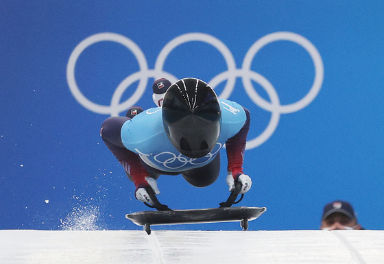 Kim Eun-ji competes in the women's skeleton event at the Yanqing National Sliding Centre during the Beijing 2022 Winter Olympic Games in Yanqing on Friday. [AFP/YONHAP]