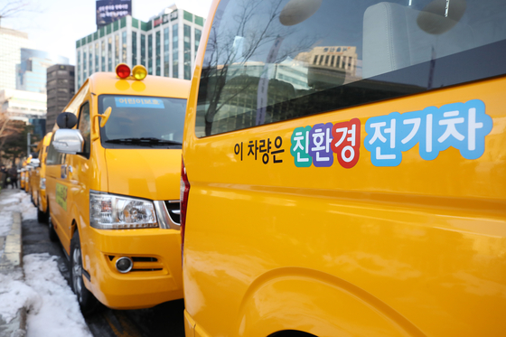 Electric commuting vehicles are parked near Seoul City Hall in central Seoul on Dec. 20, 2021. [YONHAP] 