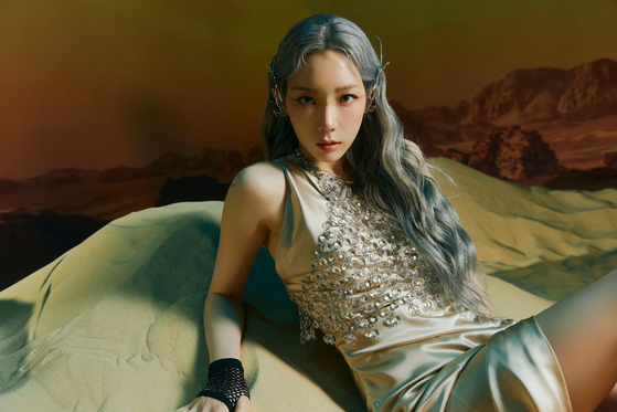 Singer Taeyeon's third full-length album "INVU" topped over a dozen iTunes charts around the world after it dropped on Monday. [ILGAN SPORTS]